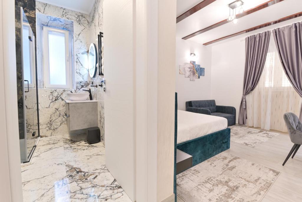 Posteľ alebo postele v izbe v ubytovaní Luxury Rooms "Kaleta"