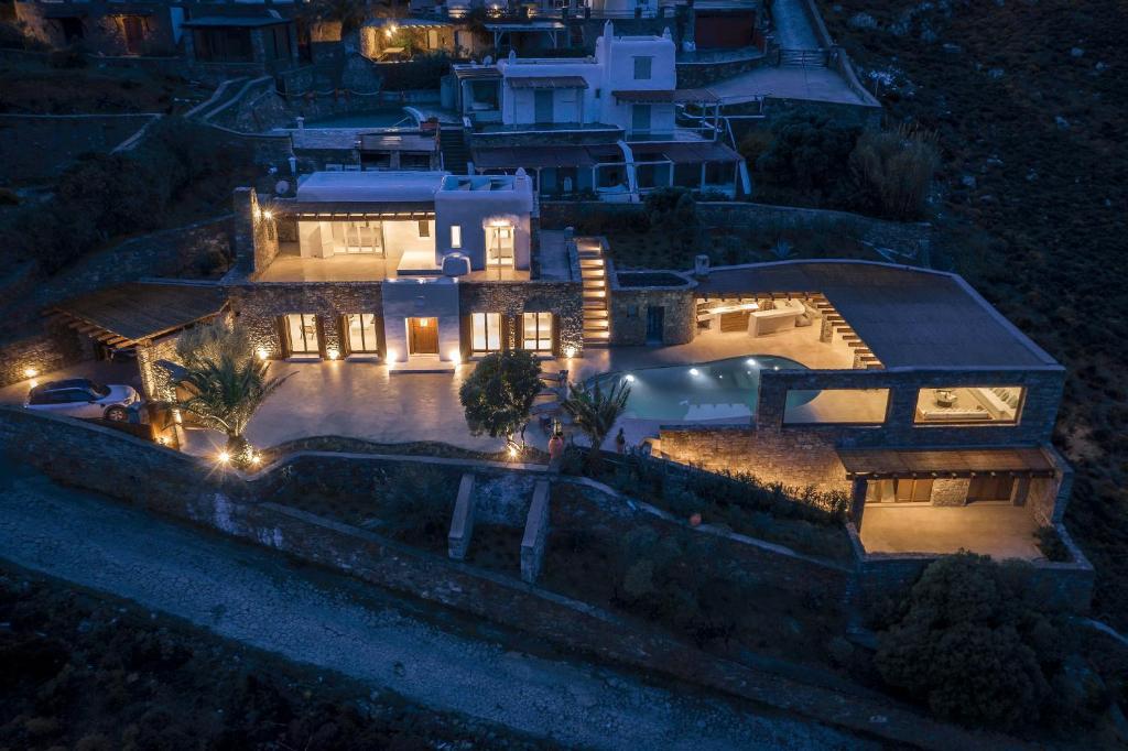 an aerial view of a house at night at Christina's Panormos Villa in Mykonos