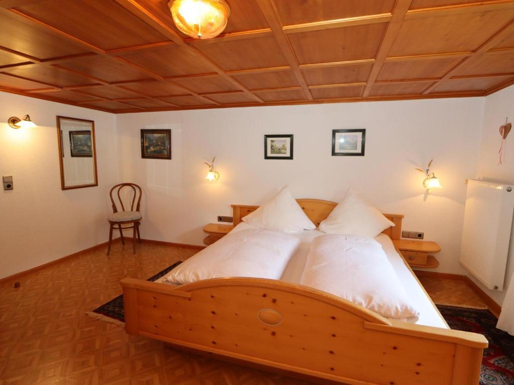 Postel nebo postele na pokoji v ubytování Enzianhof