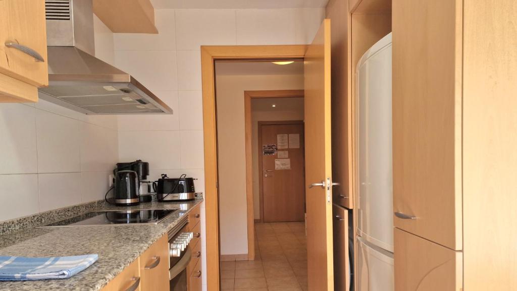 Kuchyň nebo kuchyňský kout v ubytování Apartment Loreto