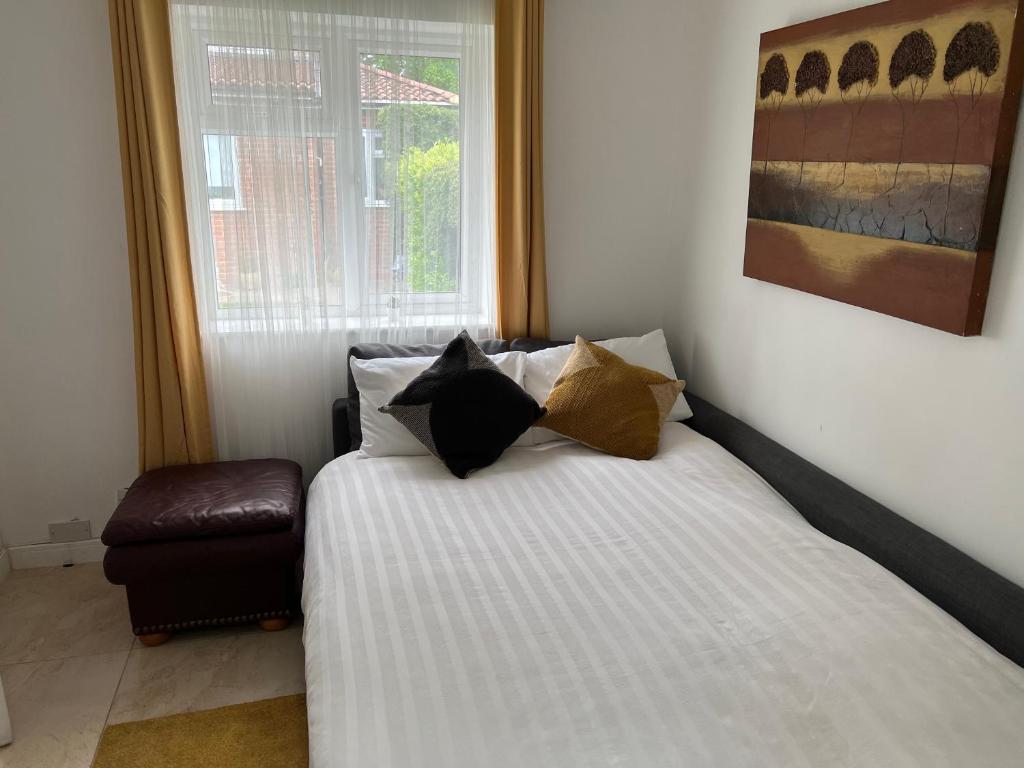 Ένα ή περισσότερα κρεβάτια σε δωμάτιο στο Dannifar Guest House