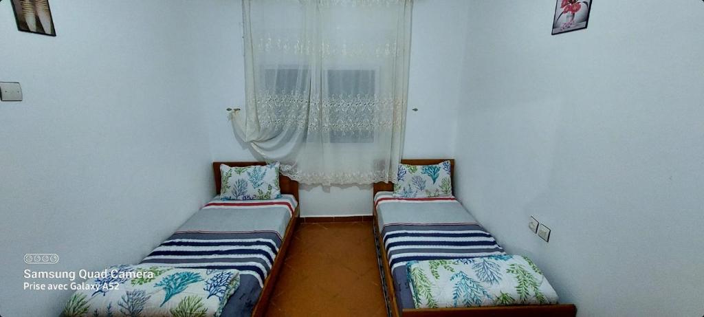 Postel nebo postele na pokoji v ubytování Appartement à OUED LAOU - TETOUAN