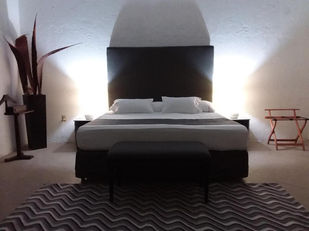 Postel nebo postele na pokoji v ubytování Junior suite Privada 7 min del Aeropuerto