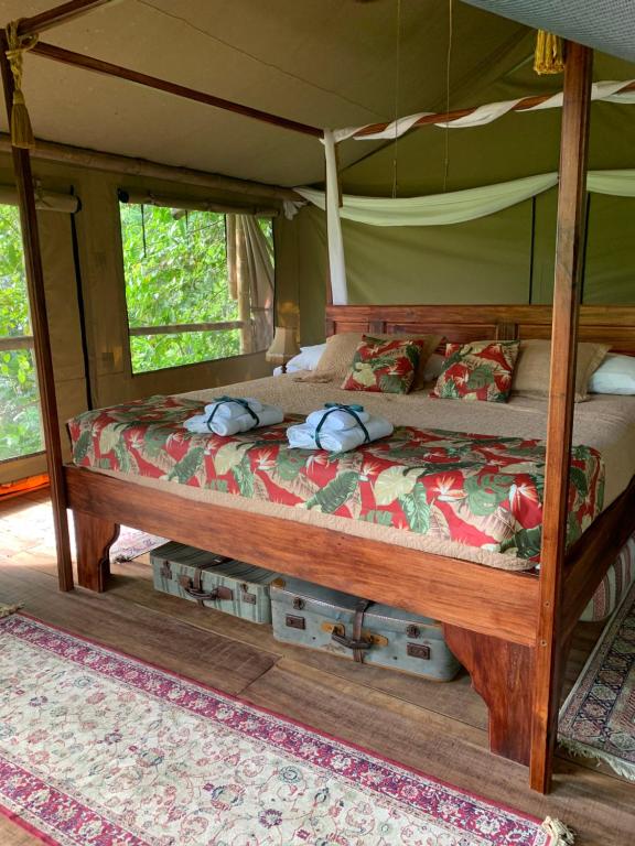 Postel nebo postele na pokoji v ubytování Colina Secreta - Glamping and Villas