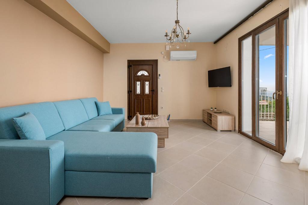 TV a/nebo společenská místnost v ubytování Lakis Residence
