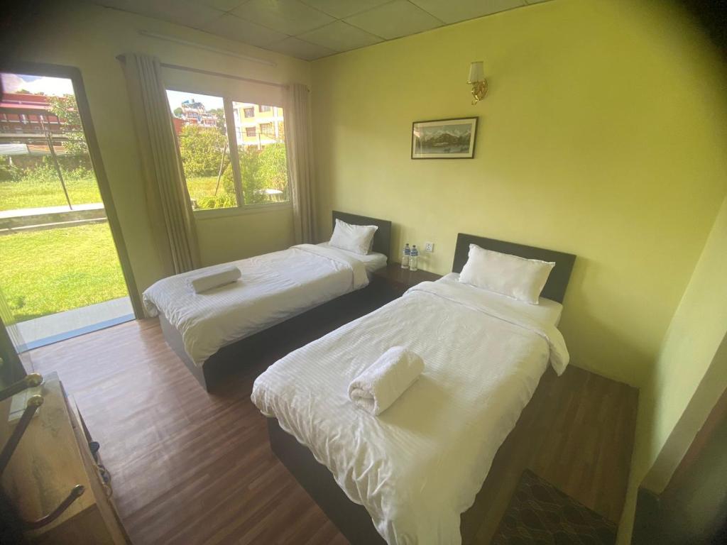 Postel nebo postele na pokoji v ubytování Ocean Inn