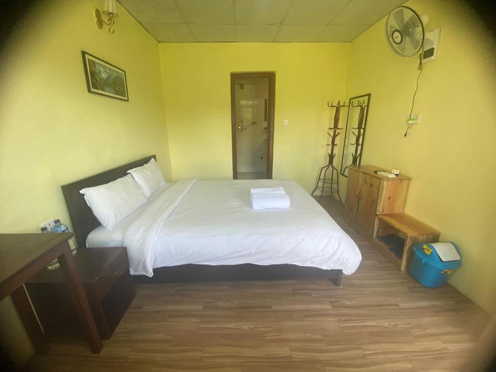 Postel nebo postele na pokoji v ubytování Ocean Inn