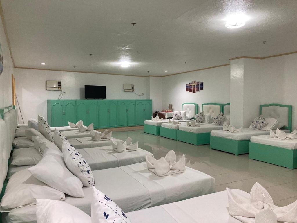 Postel nebo postele na pokoji v ubytování Demiren Hotel