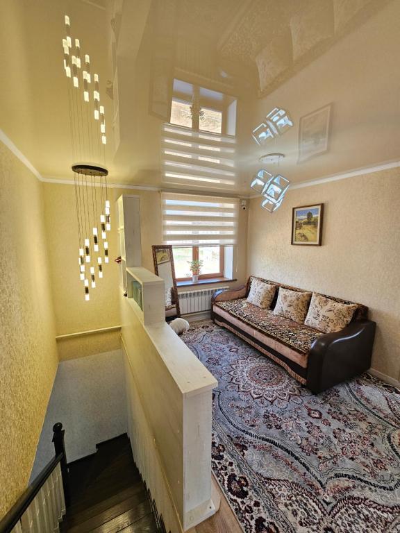 Posezení v ubytování Guest House Tenir Too
