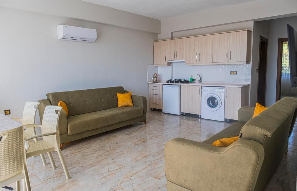 Kuchyň nebo kuchyňský kout v ubytování Olive Tree Apart Hotel