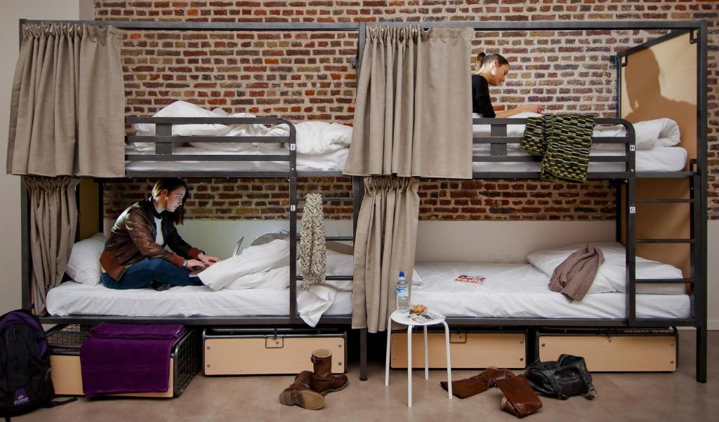 Postel nebo postele na pokoji v ubytování The People - Lille