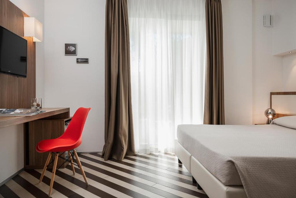 TV a/nebo společenská místnost v ubytování Dan Hotel