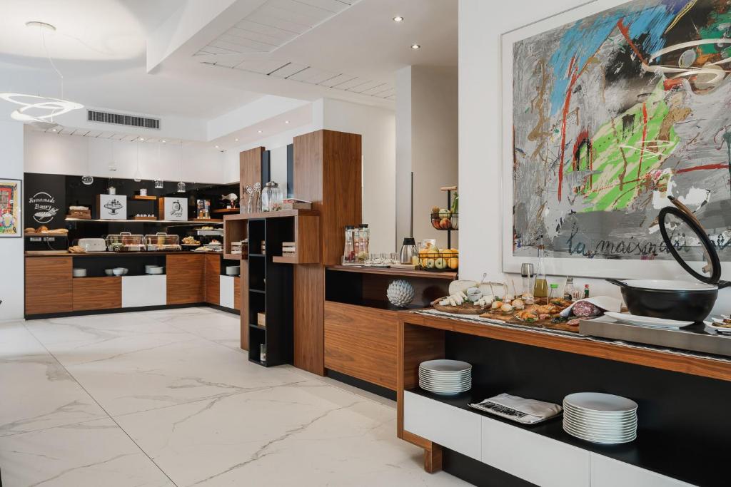Kuchyň nebo kuchyňský kout v ubytování Dan Hotel