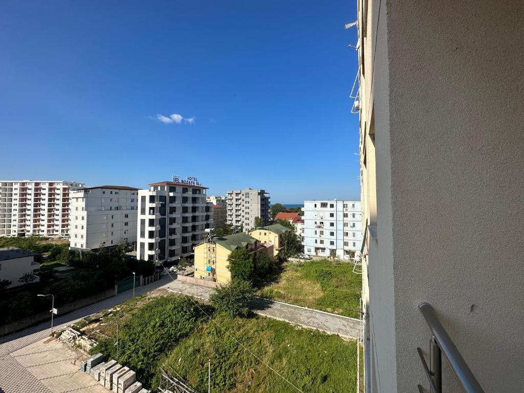 a view of a city from a window of a building at Marjana's Apartment 4 in Lezhë