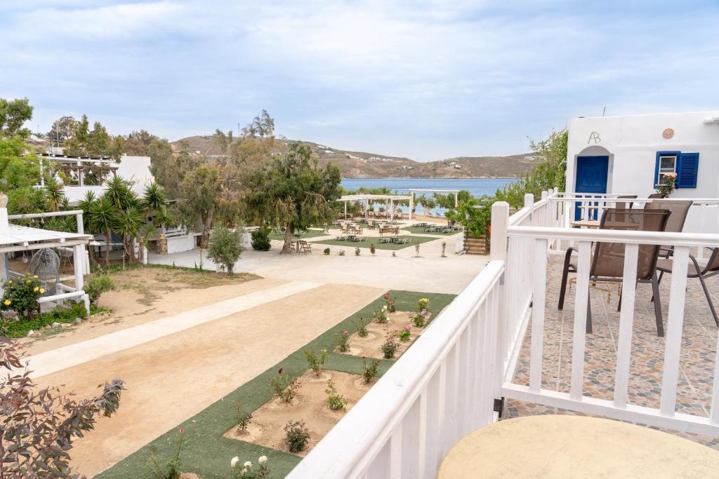 a view from the balcony of a house with a garden at Alexandros by the Beach - Serifos in Livadakia