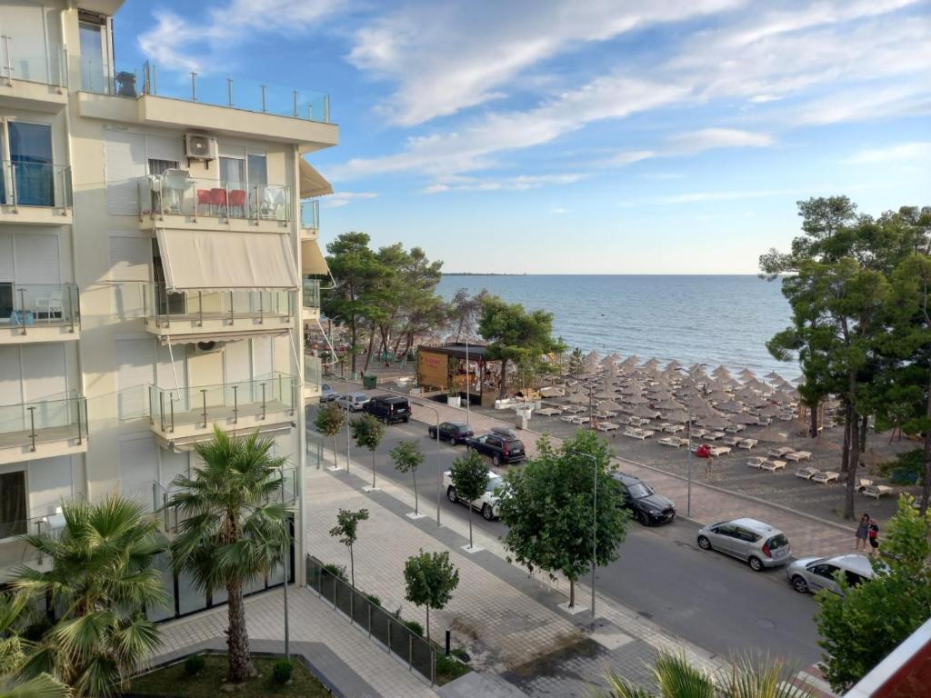 a view of the ocean from a building at Marjana's Sea View Apartment 1 in Lezhë