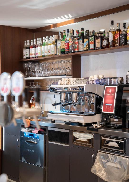 Kuchyň nebo kuchyňský kout v ubytování Hotel Rudy