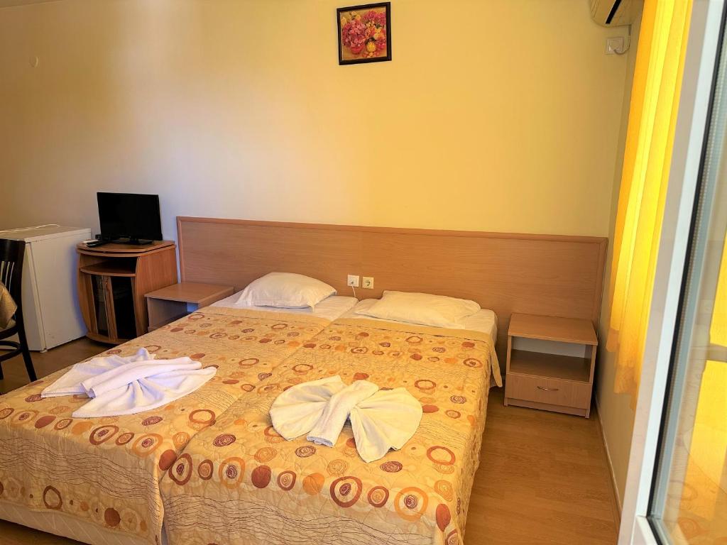 Postel nebo postele na pokoji v ubytování Bravo 1 Morenia