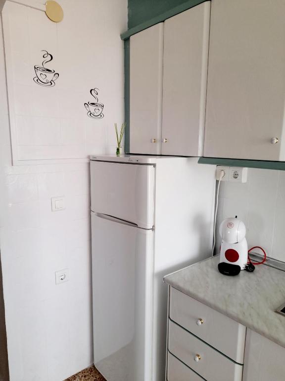 Kuchyň nebo kuchyňský kout v ubytování APARTAMENTO VISTAS AL MAR, 11 Planta, 50M PLAYA!!