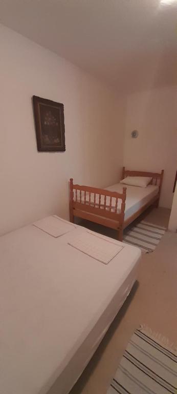 Postel nebo postele na pokoji v ubytování Guest house Ruzica