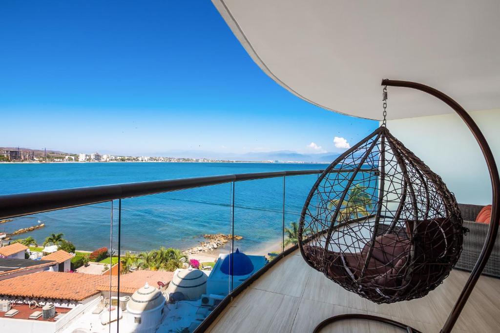 a view of the ocean from a balcony at Tizate Residences #136 in Cruz de Huanacaxtle