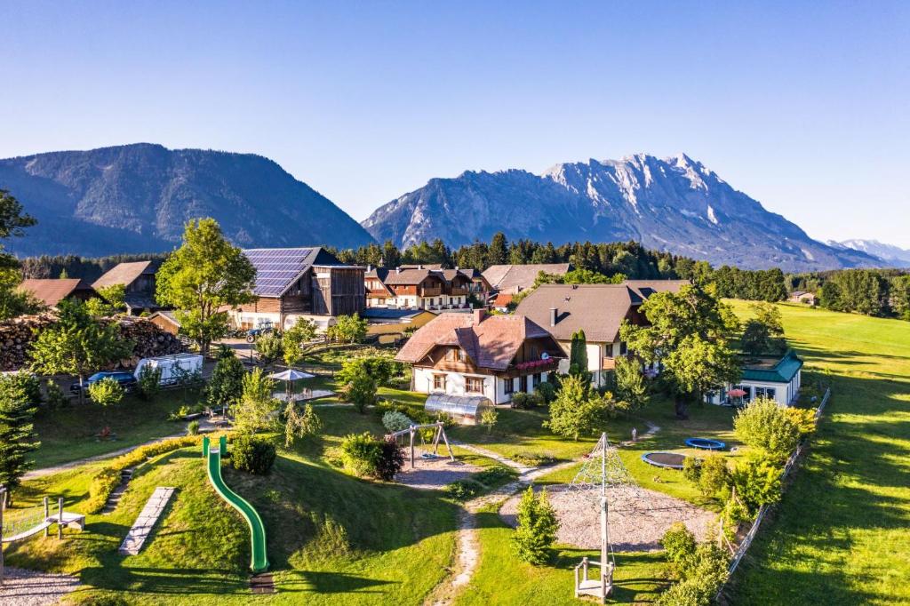 an aerial view of a resort with mountains in the background at Reisslerhof in Gröbming