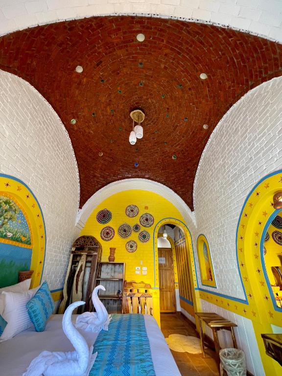Postel nebo postele na pokoji v ubytování Kato Dool Wellness Resort