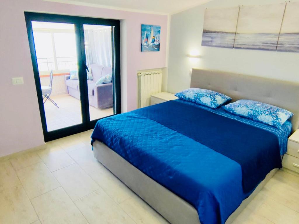 Postel nebo postele na pokoji v ubytování Sognando Agropoli