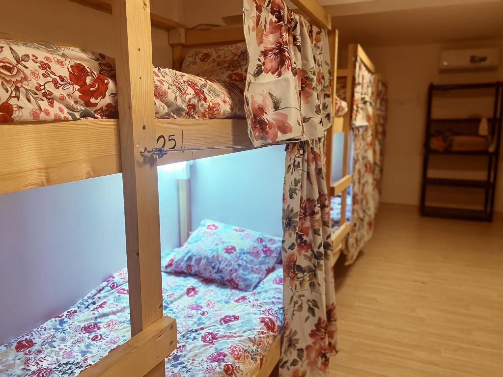 a group of bunk beds in a room at Unique City Hostel 100 meters from Beach in Larnaca