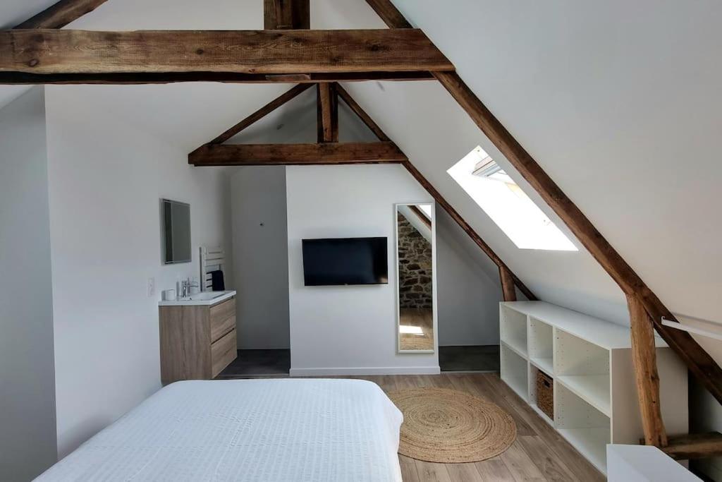 Postel nebo postele na pokoji v ubytování Le P'tit Indus , Duplex