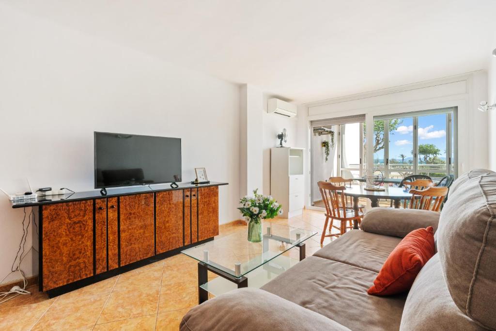 TV a/nebo společenská místnost v ubytování WELCS DUPLEX 025 EMP frente al Mar