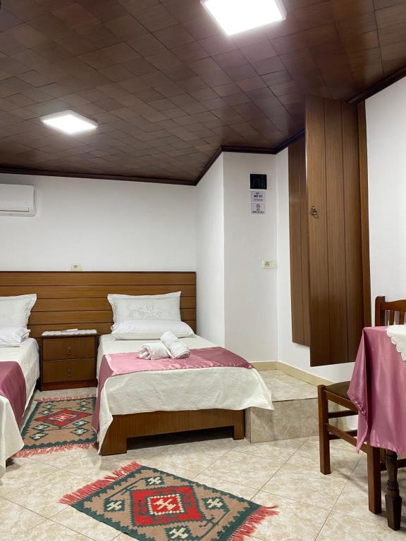 Postel nebo postele na pokoji v ubytování Yuri Guest House