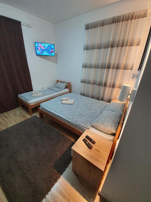 TV a/nebo společenská místnost v ubytování STUDIO VIK