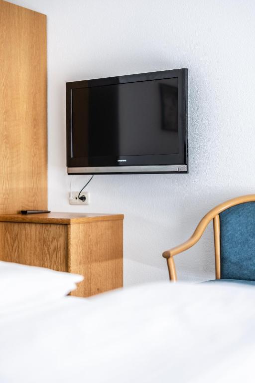 TV a/nebo společenská místnost v ubytování Rössle Appartement