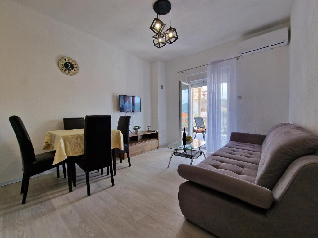 a living room with a couch and a table at VistaRelax in Trebinje