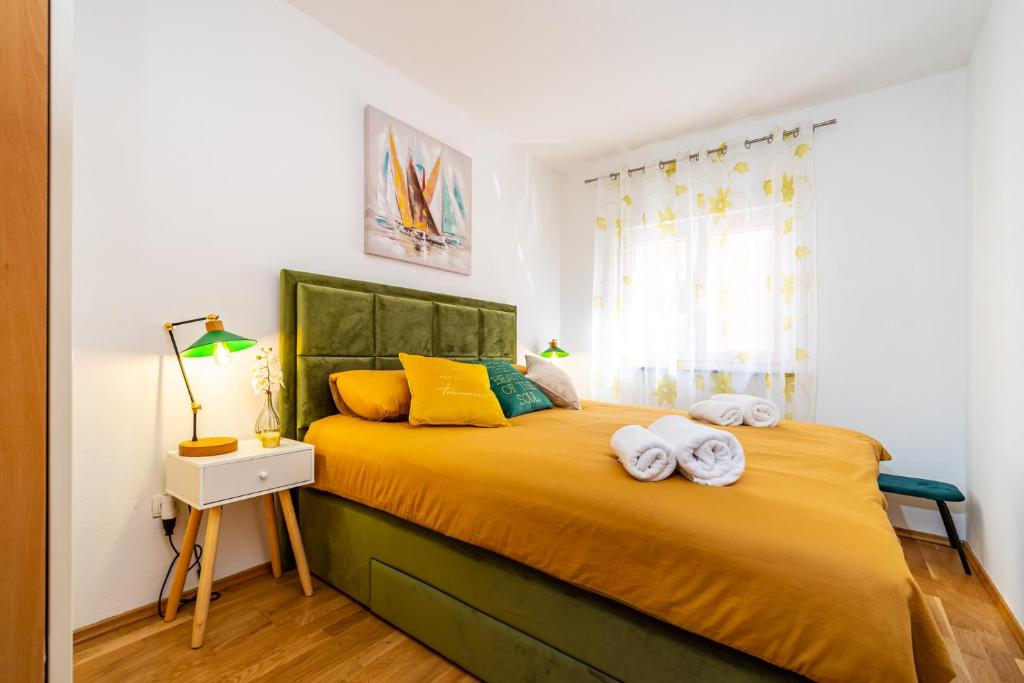 Postel nebo postele na pokoji v ubytování Apartment Nekić Posedarje