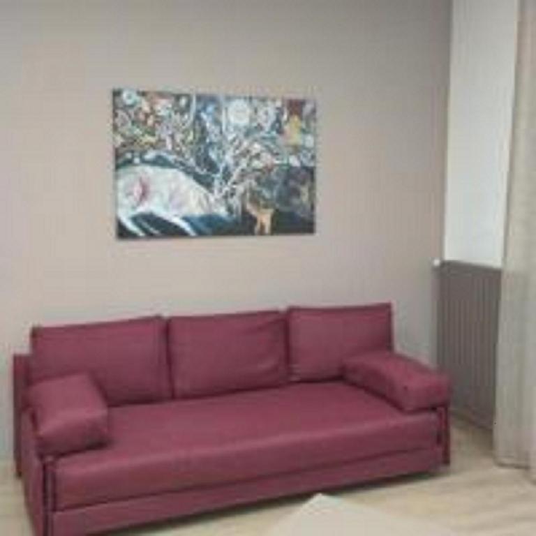 A seating area at Renovated Loft with Vesuvio view terrace