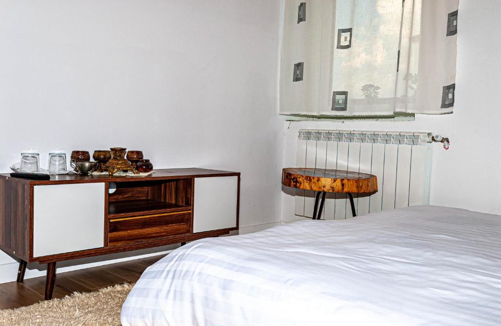 Een bed of bedden in een kamer bij N'konak Guesthouse