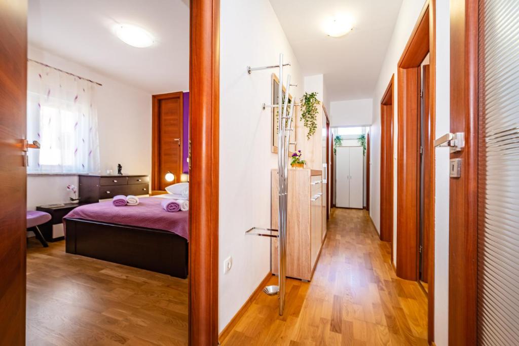Postel nebo postele na pokoji v ubytování Apartment Nekić Posedarje
