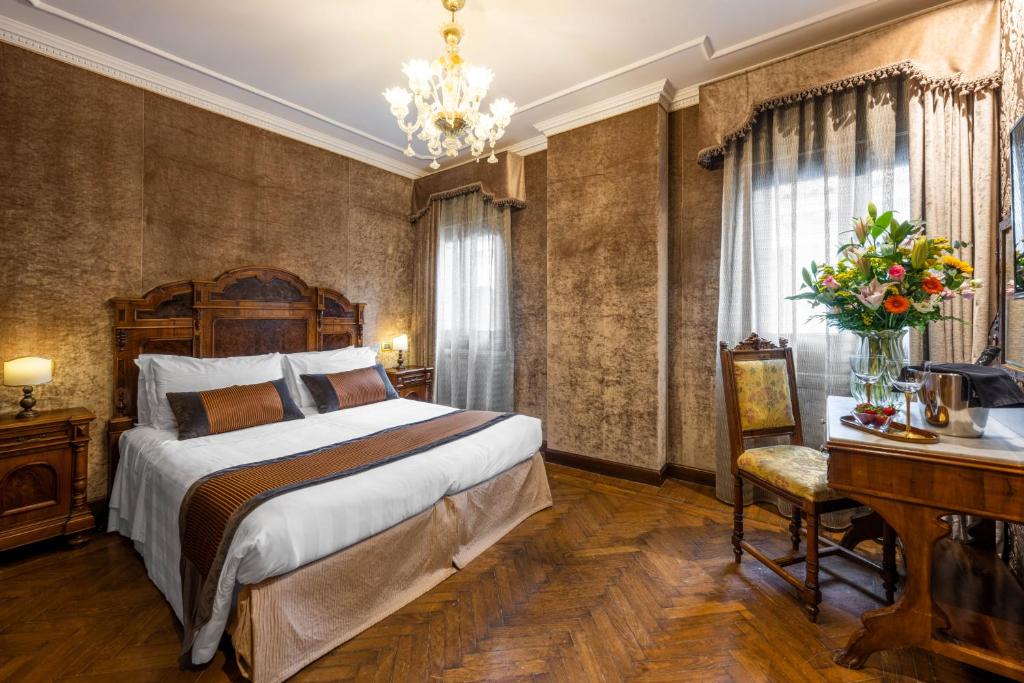 Postel nebo postele na pokoji v ubytování Palazzo Bembo - Exclusive Accommodation