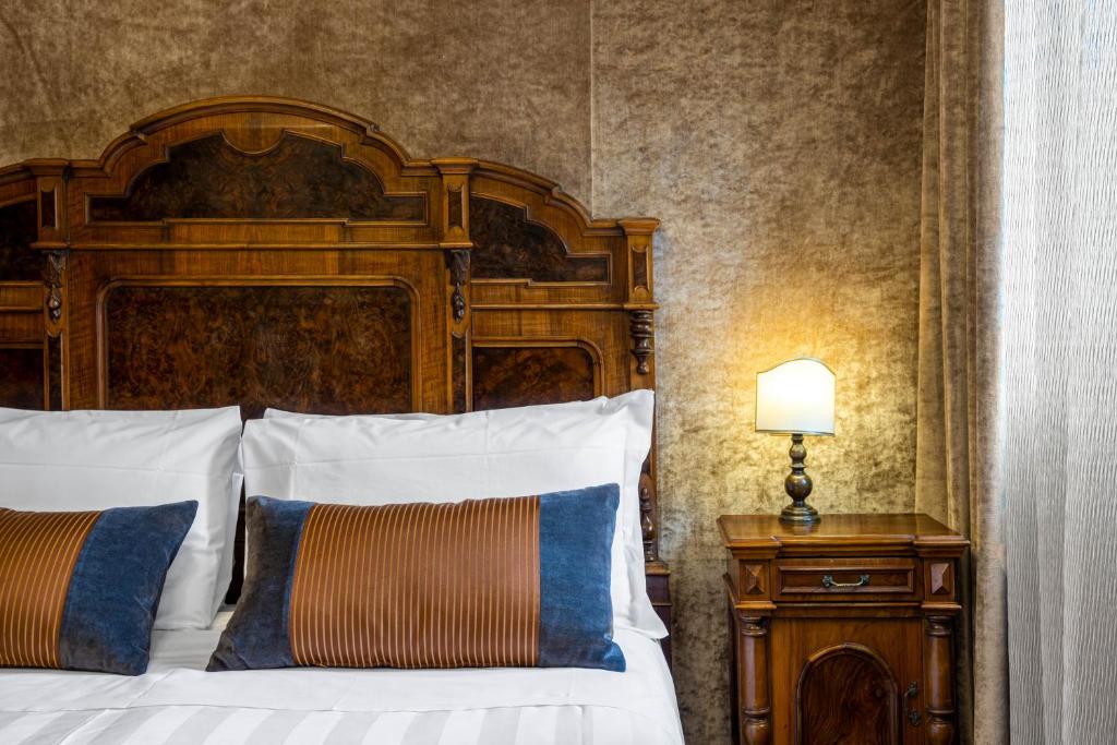 Postel nebo postele na pokoji v ubytování Palazzo Bembo - Exclusive Accommodation