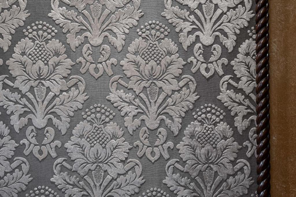 a close up of a gray and white damask pattern at Palazzo Bembo - Exclusive Accommodation in Venice