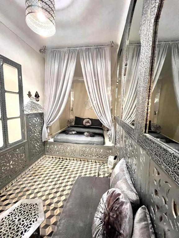 Postel nebo postele na pokoji v ubytování Riad 1001 couleurs