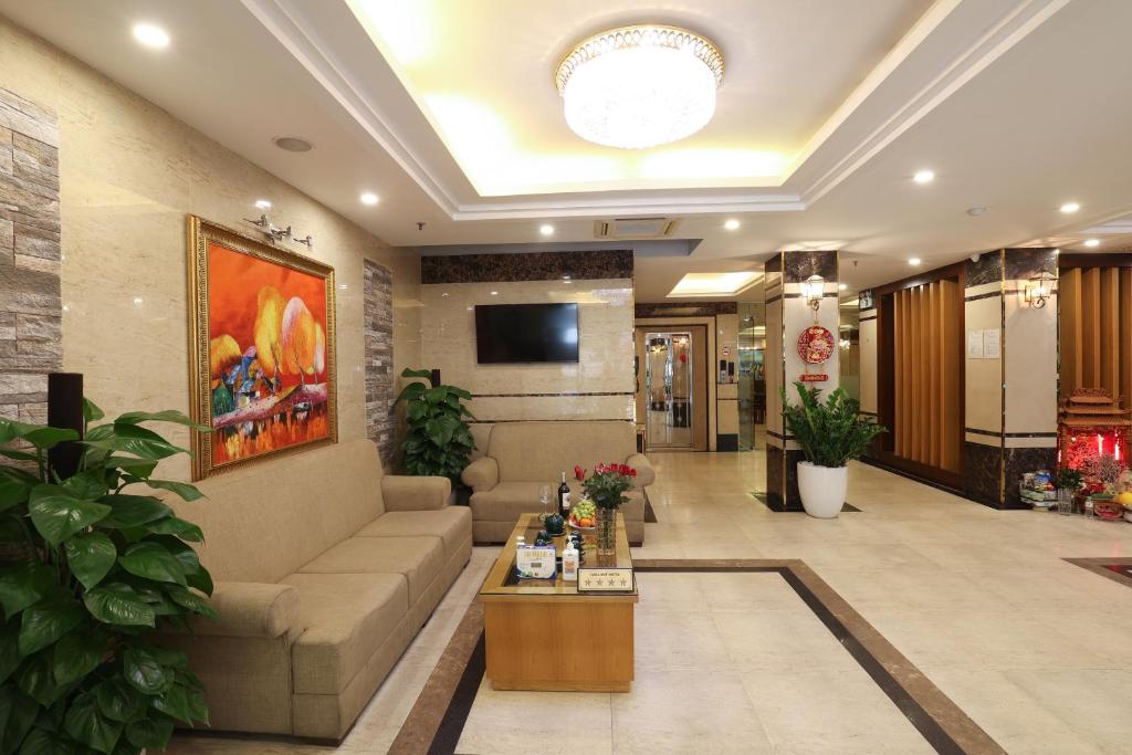 TV a/nebo společenská místnost v ubytování Gallant Hotel