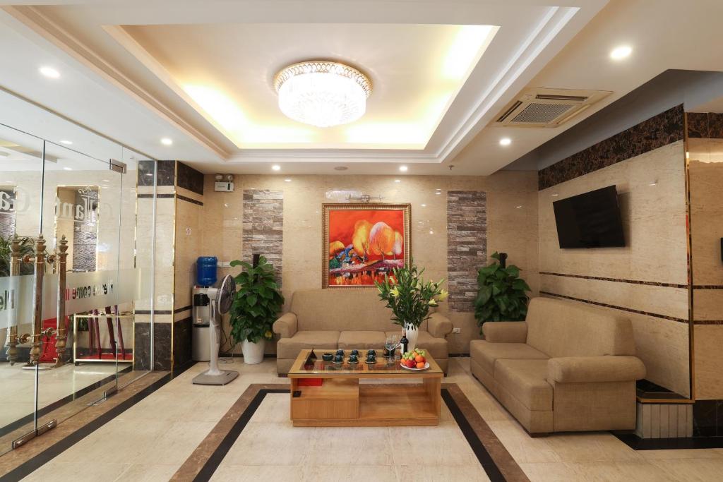TV a/nebo společenská místnost v ubytování Gallant Hotel