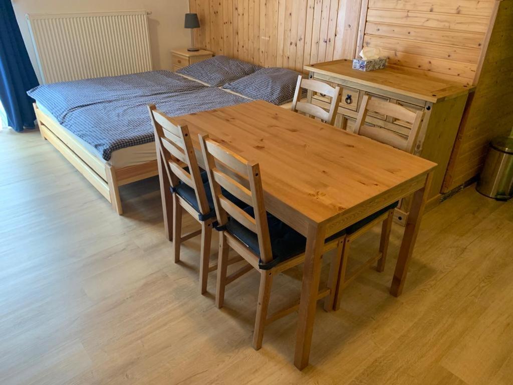 Postel nebo postele na pokoji v ubytování Penzion a Restaurace Vyhlídka