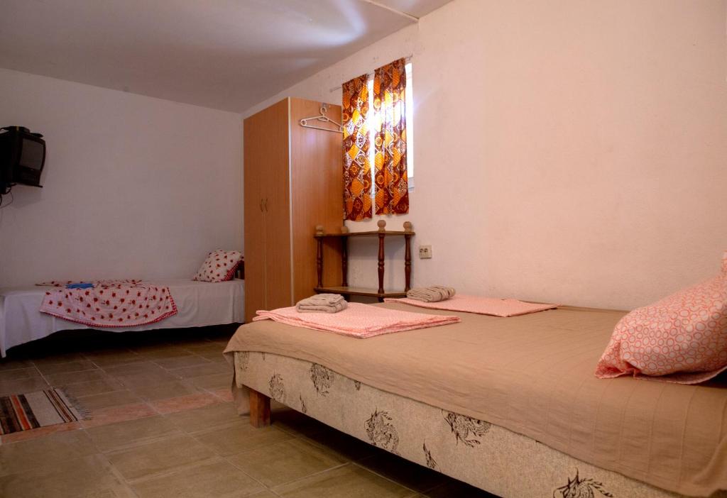 Postel nebo postele na pokoji v ubytování Villa Horizon Canj