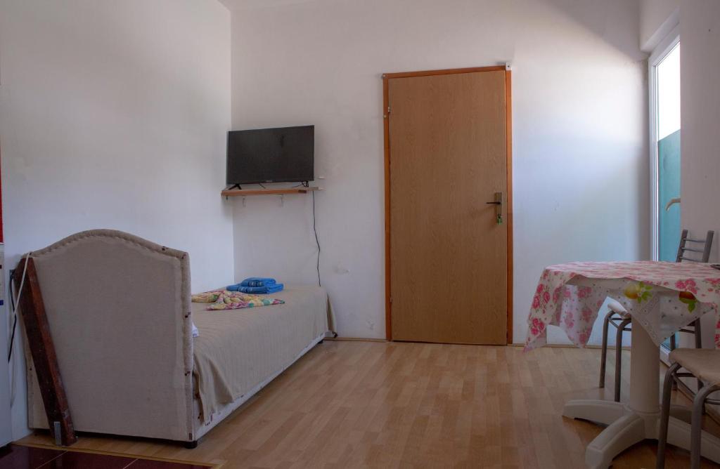 TV a/nebo společenská místnost v ubytování Villa Horizon Canj