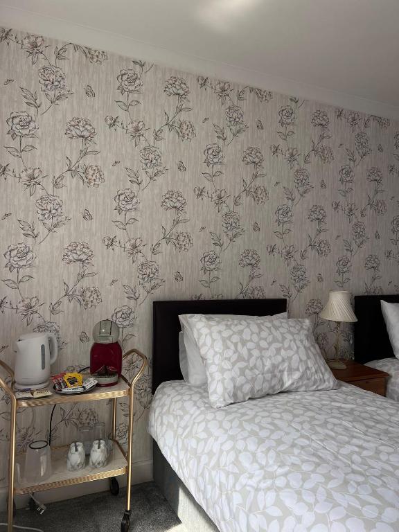 Letto o letti in una camera di Dunrigh Guest House