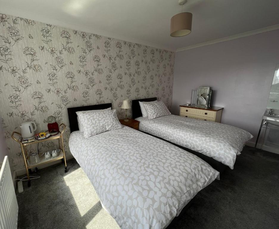 Letto o letti in una camera di Dunrigh Guest House